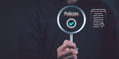 professional meticulously reviews multiple virtual documents, Concepts of practices and policies, company articles of association Terms and Conditions, regulations and legal advice, corporate policy photo