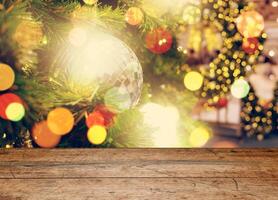 Empty wooden table and holiday background photo