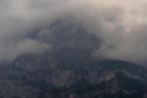 Paganella mountain, Trydent. Panorama of the Alpine Mountains in South Tyrol, Italy. Blurred background photo