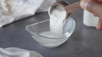 Creating a simple baking soda mixture for household use video