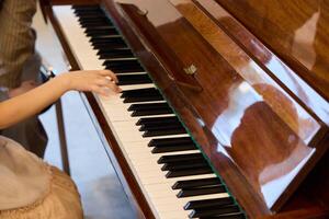 An Elegant and Captivating Piano Performance Showcasing Graceful Hand Movements and Skills photo