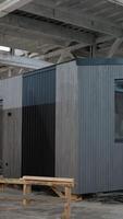 Rotating prefabricated tiny house under construction video