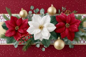 Christmas poinsettias and golden ornaments creating a festive garland on red background photo
