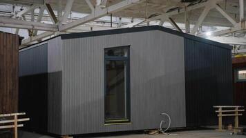 Modular house under construction in a factory video