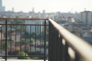 View over urban landscape from balcony railing photo