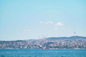 Coastal view of a Turkish city under a clear sky photo