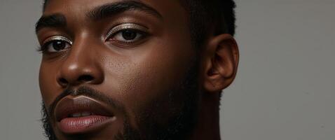 A close up of a black man with a beard photo