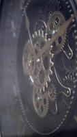 Intricate clock gears in motion showcase craftsmanship video