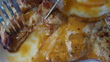 Grilled chicken with spicy sauce in local restaurant video