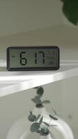 Digital alarm clock shows 6 17 PM on Thursday, July 28 video
