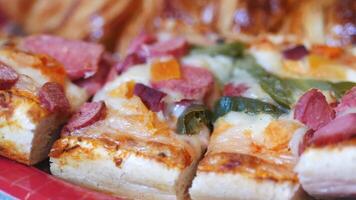 Delicious pizza with assorted toppings prepared at home video