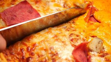 Perfectly sliced pizza with delicious toppings for everyone video