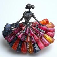 Multicolored gems brooch isolated on white background showcasing intricate design with a graceful figure elegantly dressed in a colorful gemstone skirt that adds a vibrant touch to any collection photo