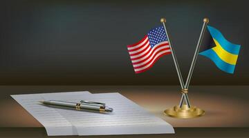 USA and Bahamas flags with notepad and pen vector