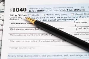 Tax Return form 1040 U.S. Individual Income in business. photo