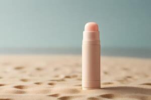 Light Pink Lip Balm on Sandy Beach Background photo