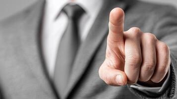 A businessman in a suit touching a finger on a virtual screen, isolated over a light gray background. 4 photo