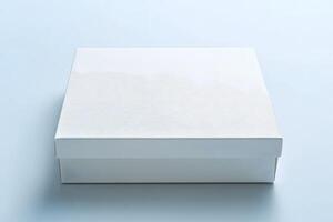 Pristine White Gift Box with Textured Lid on a Light Blue Surfac photo