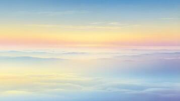 Serene Aerial View of Misty Mountains Under a Pastel Sky at Dawn photo