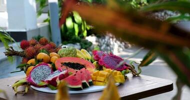 A vibrant fruit platter with assorted fresh fruits, ideal for summer picnics and festive gatherings video