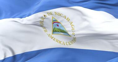 Nicaragua flag waving at wind with blue sky in slow, loop video