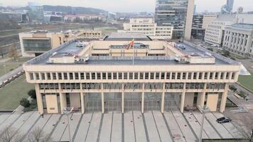 Vilnius, Lithuania - 26th november, 2024- aerial panning view building of Parliament of the Republic of Lithuania.The Seimas constitutes the legislative branch of government in Lithuania video