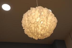 This elegant white pendant light fixture is perfect for modern interiors and stylish spaces photo