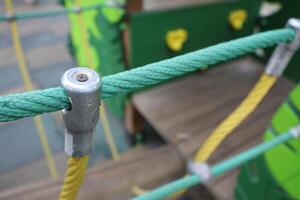 Colorful Playground Equipment Featuring a Unique Rope Structure for Active Fun and Adventure photo