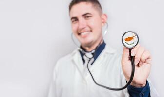 Doctor showing stethoscope with Chipre flag. Chipre national healthcare concept photo
