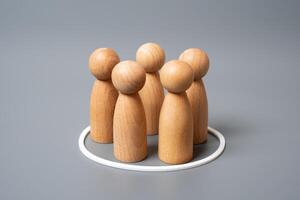 A group of human figures in a white circle. A selection of people. Recruitment, survey sampling, or targeted focus groups. Targeted marketing photo