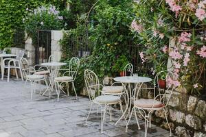 Empty cafe by the sea in Przno near Budva, Montenegro. Travel destination in Montenegro. photo