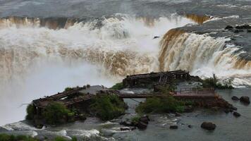 Aerial. Devil's Throat at Iguazu Falls marking the Brazil and Argentina border video