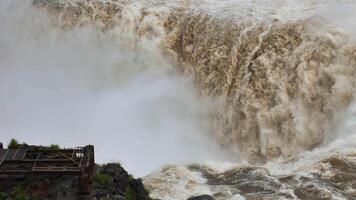 Ruined viewing platform near Devil's Throat as Iguazu Falls roars in the back video