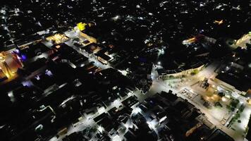 Aerial view of illuminated Bukhara mosques, minarets and ancient architecture at night video