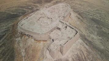 Top-down view revealing circular structure in Ayaz-Kala fortress video