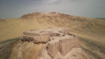 Elevated view of Khorezmian ruins above the barren desert land video