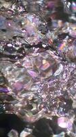 Abstract iridescent liquid background, shimmering texture with light reflections. photo