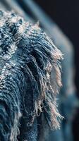 Close Up of Frayed Denim Fabric Texture, Showing Detailed Textile Fibers. photo