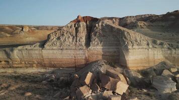 Aerial view of dramatic layered cliffs and colorful hills in Aktumsuk region video