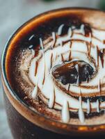 Close up of Iced Coffee with Cream Swirl and Ice Cube. A detailed image showcasing the texture and artistry of a gourmet coffee beverage. photo