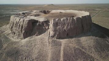 Top view of Chilpik tower surrounded by endless dry landscape video