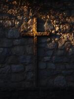 Stone Cross on Ancient Wall at Sunset. A close up view of a weathered stone cross affixed to a rustic stone wall, bathed in the warm glow of the setting sun. photo