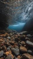 Underwater Riverbed Sunbeams Illuminating Smooth River Stones. photo