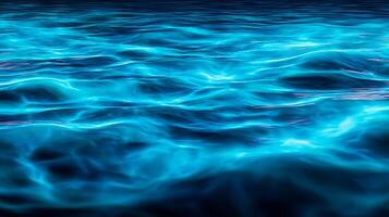 Abstract Blue Water Surface Rippling Texture and Glowing Light. photo