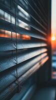 Sunset Light Filtering Through Wooden Window Blinds, Close Up Texture. photo