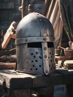 Medieval Knight's Helmet Resting on Rustic Wooden Table. A close up image of historical armor. photo