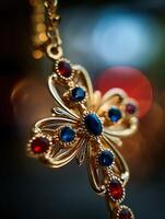 Close up of a Gold Butterfly Pendant with Red and Blue Gemstones. The intricate detail of the jewelry is highlighted against a blurred background. photo