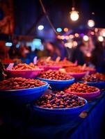 Night Market Delights Close Up of Bowls of Dates and Dried Fruits. photo