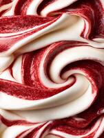 Close up of Swirled Red and White Ice Cream, Delicious Dessert Texture. photo