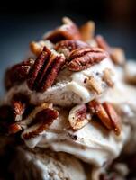 Close Up of Creamy Ice Cream Topped with Pecan Pieces. photo